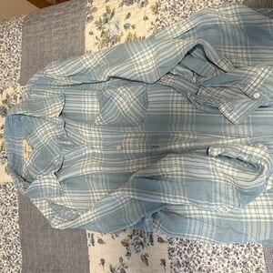 Long sleeve flannel shirt.